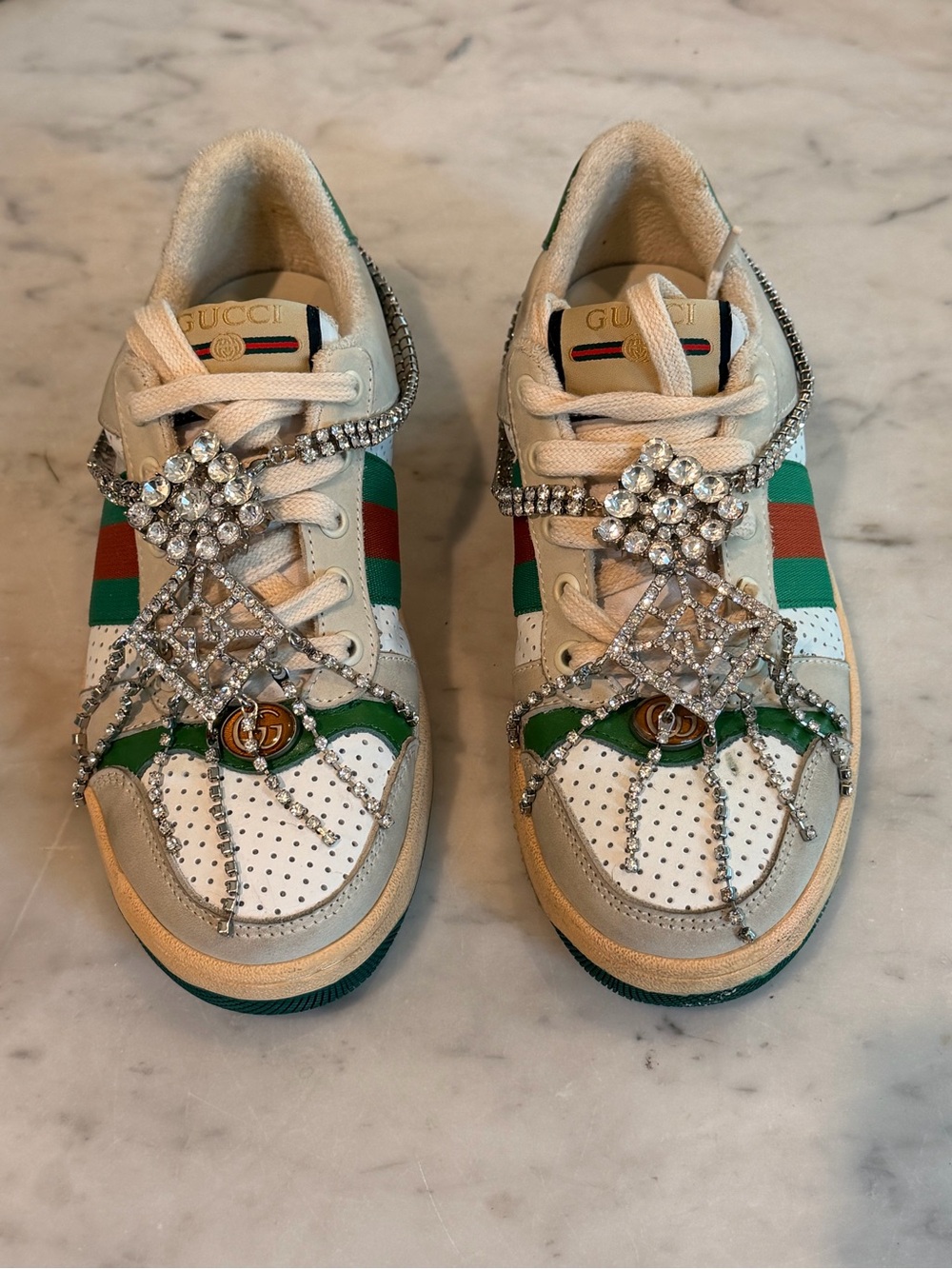 Killer Gucci screener sneakers with art deco embellishment from 2022